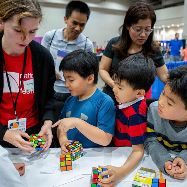 2019 Festival attendees play with Rubik's cubes
