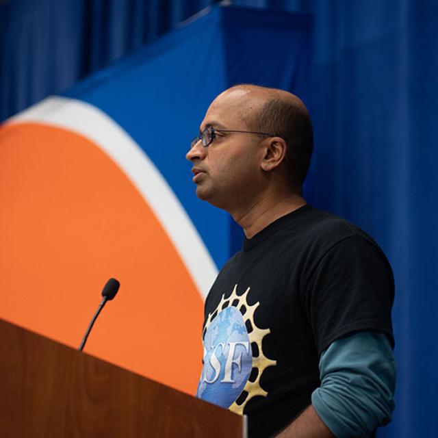National Science Festival representative speaking into microphone at 2019 festival