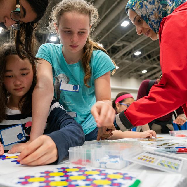 2019 Festival attendees playing with pattern blocks