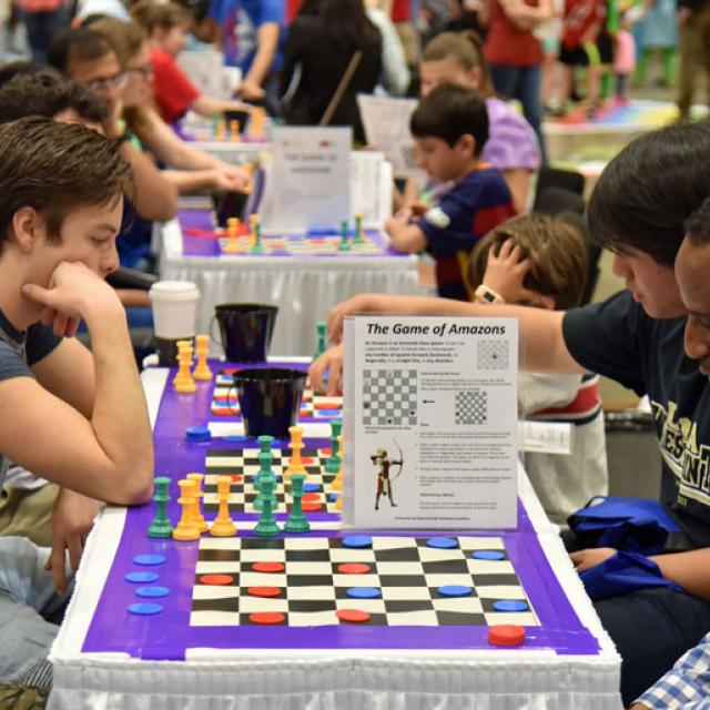 Event attendees playing The Game of the Amazons - National Math Festival 2019