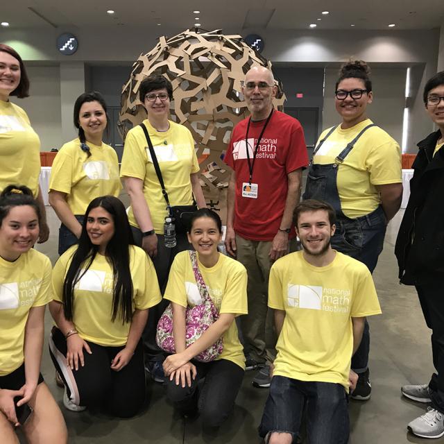 Event volunteers smiling - National Math Festival 2019