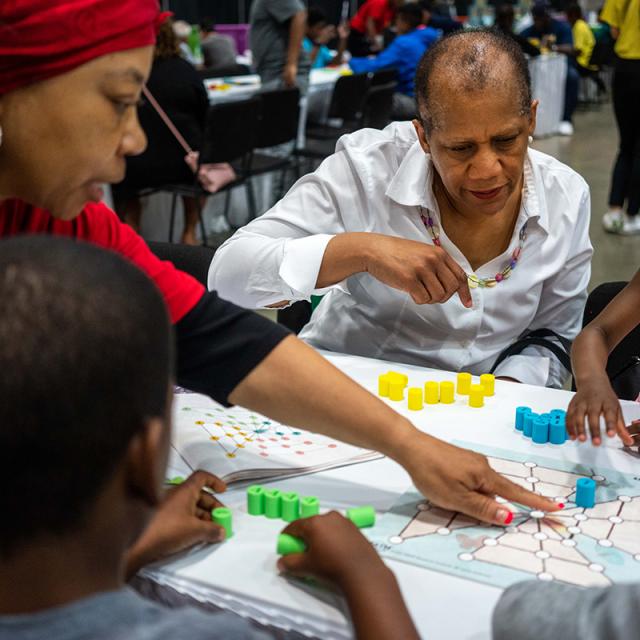 2019 Festival attendees playing a board game