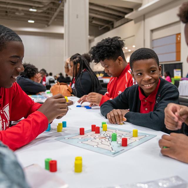 2019 festival attendees playing with colorful game pieces