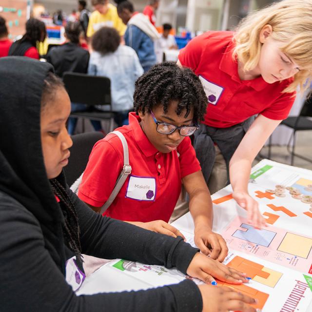 2019 Festival attendees focused on shape puzzles